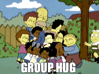 Cartoon kids from "The Simpsons" piling on each other, caption: group hug