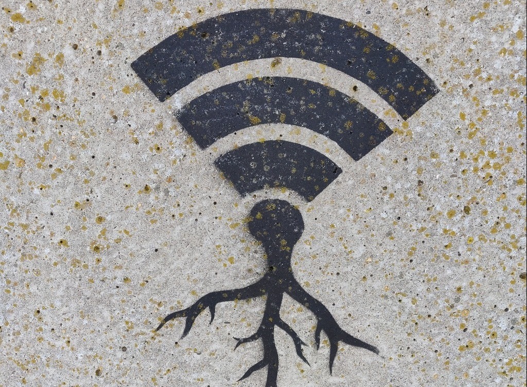 A Wi-Fi logo spray painted on the ground.